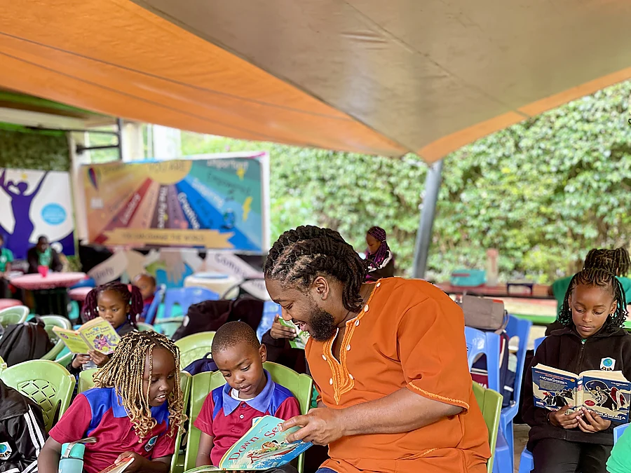 Bernard signing books and speaking with readers